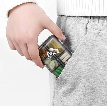 Model placing pill pack in pocket