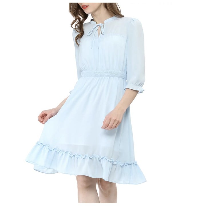 A light blue ruffle hem dress