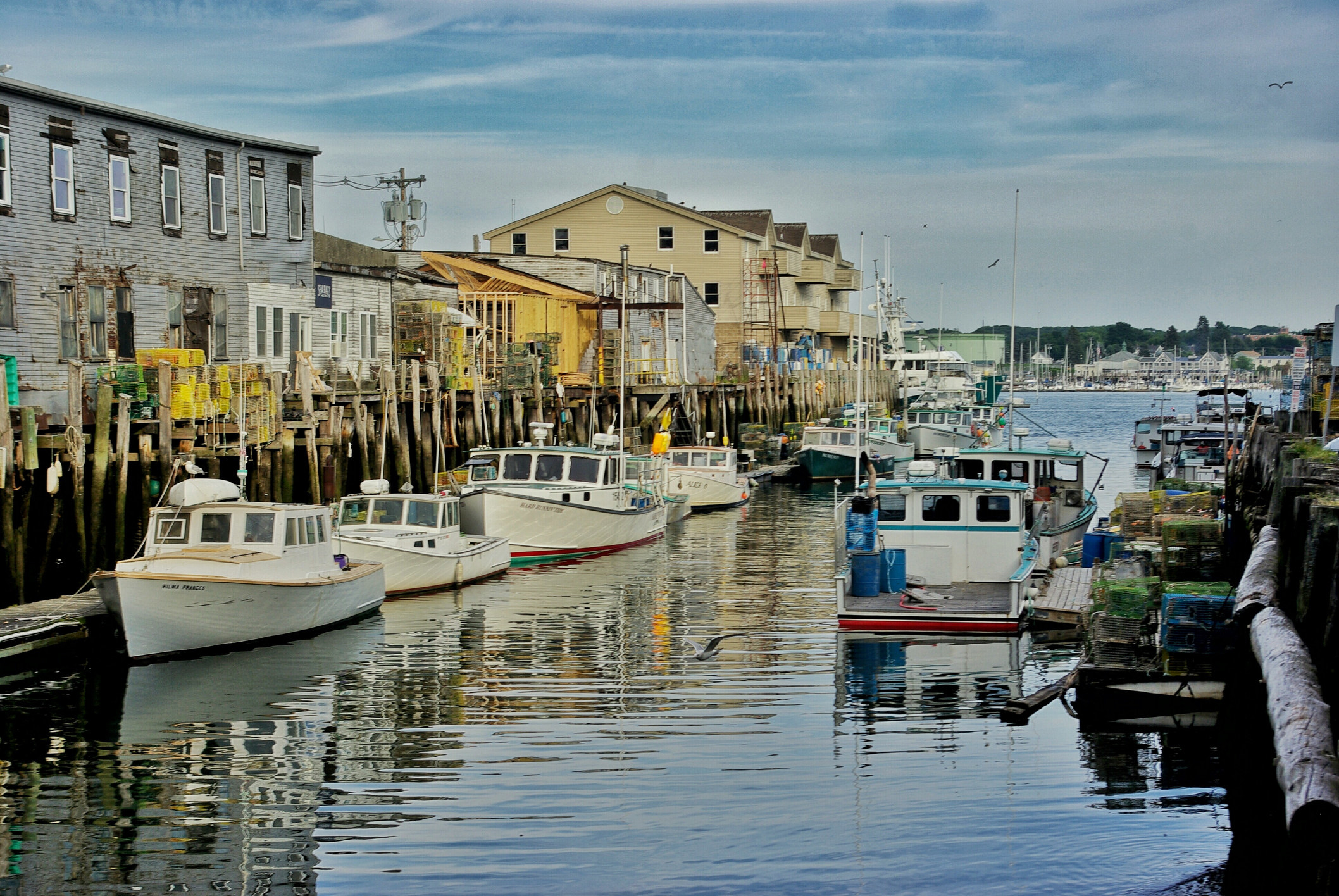 Boats and warehouses in a port in Portland, Maine