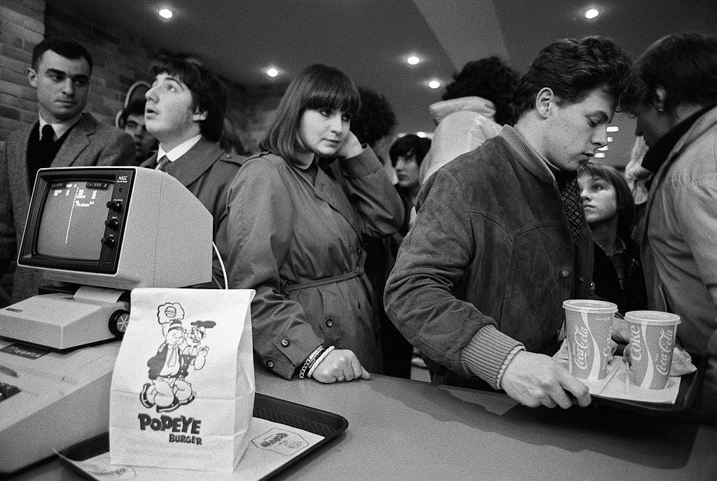 People waiting in line to order food