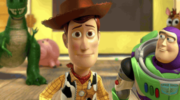 Buzz puts an arm around Woody in Toy Story