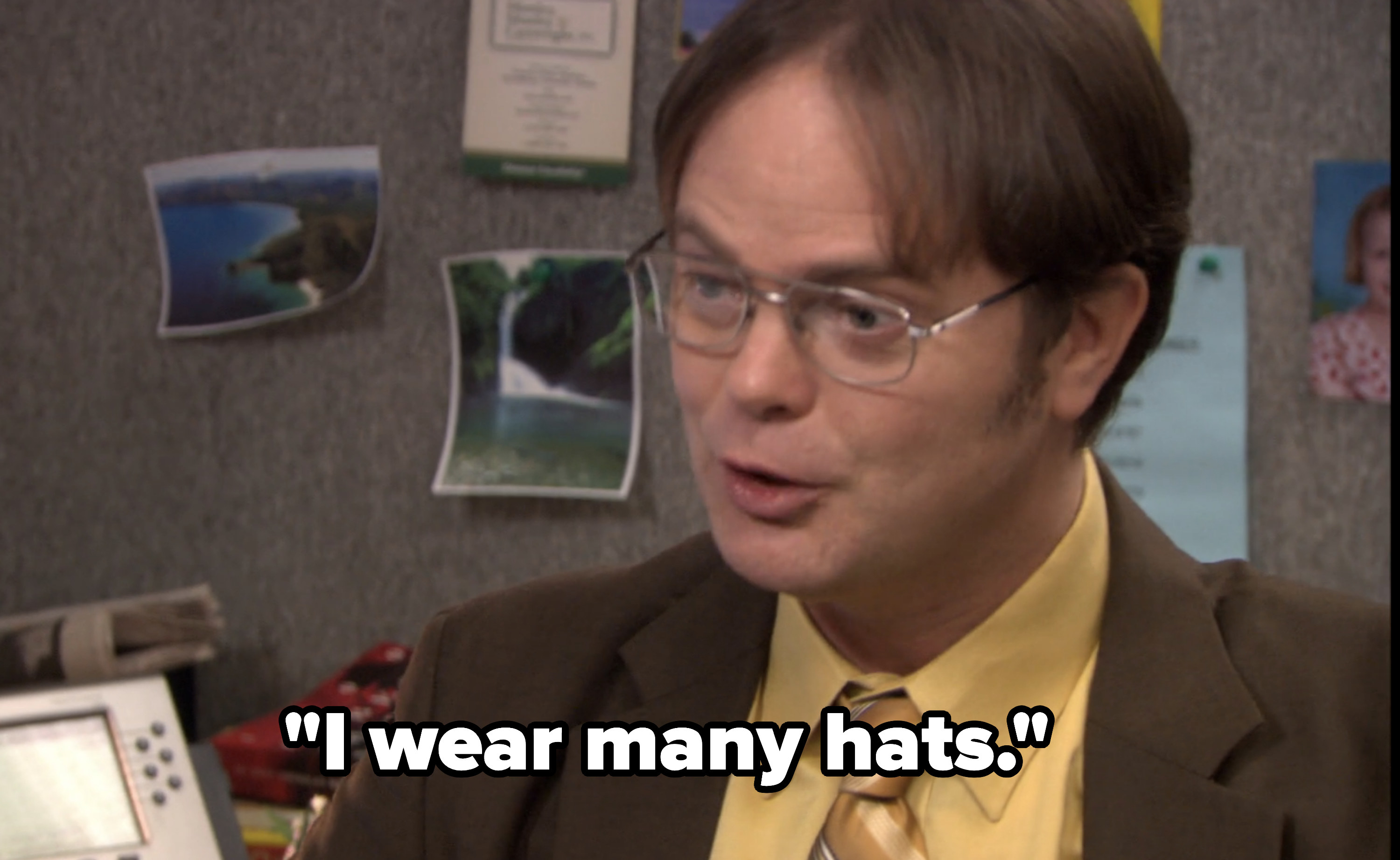 Dwight Schrute saying, &quot;I wear many hats&quot;