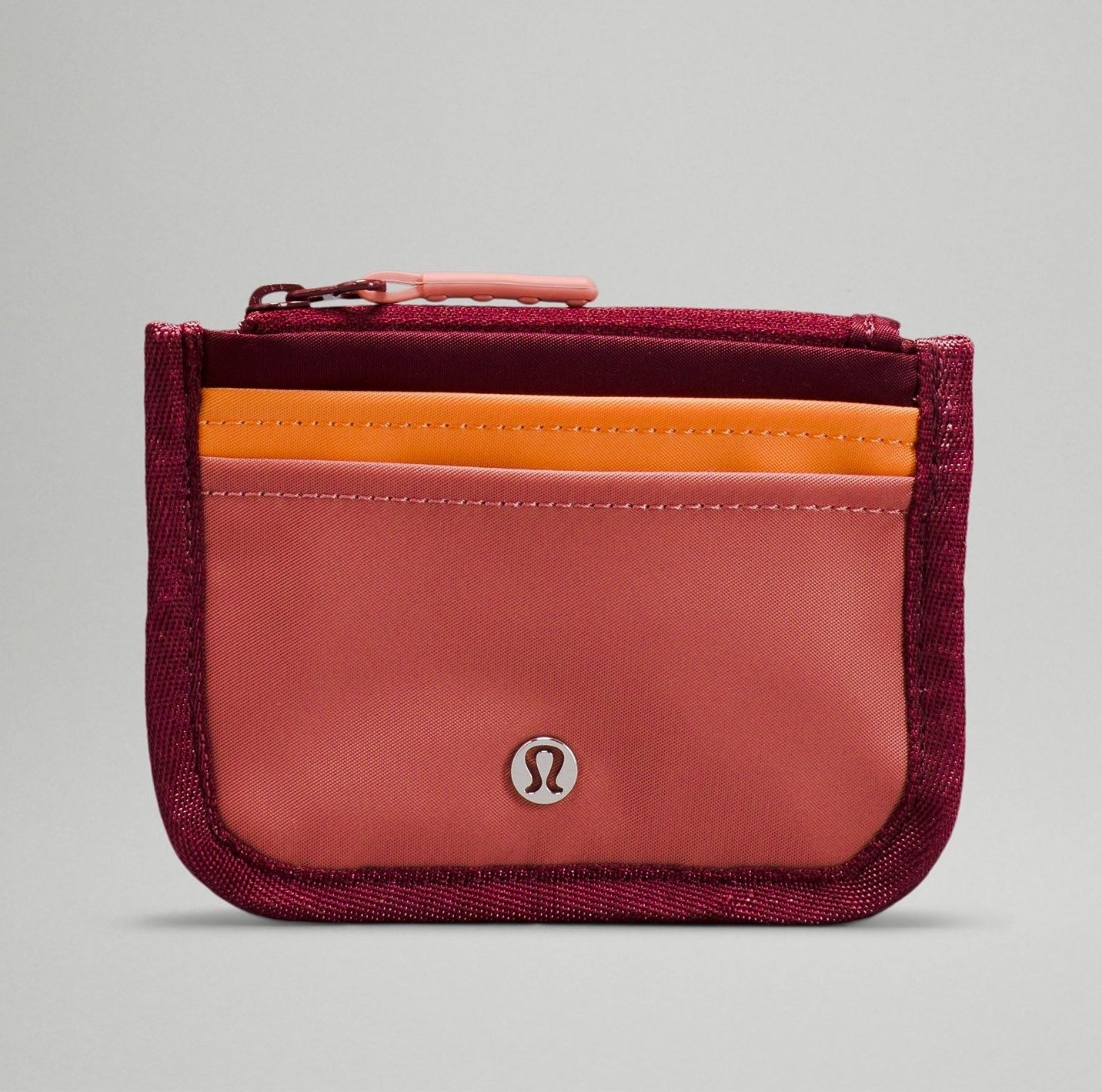 a zip-up card holder with slots for cards