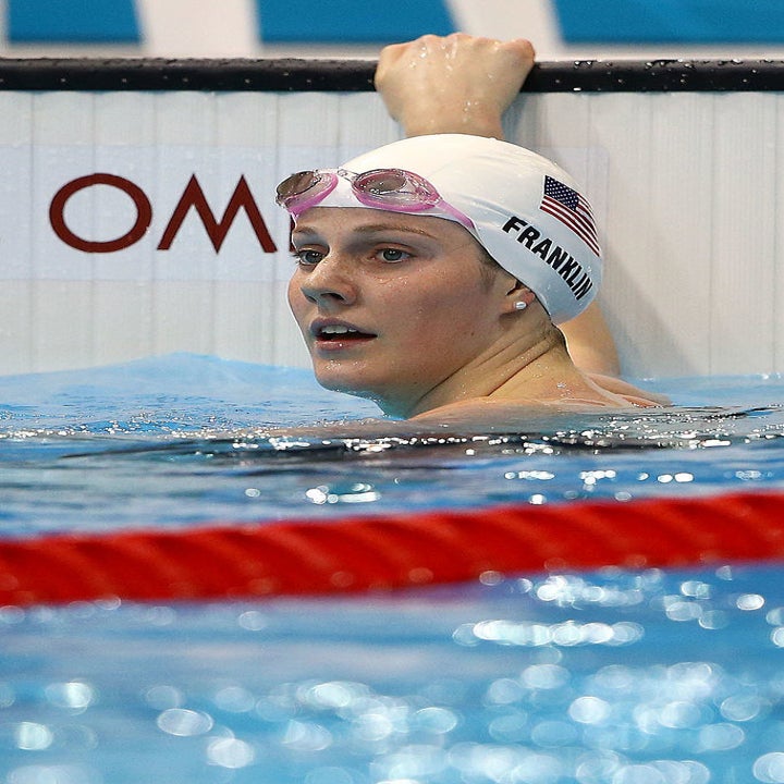 Molly swimming at the olympics