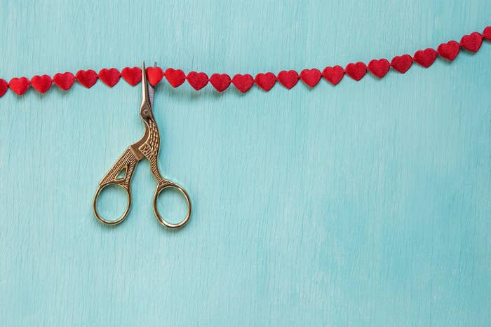 Scissors cut heart shaped ribbon