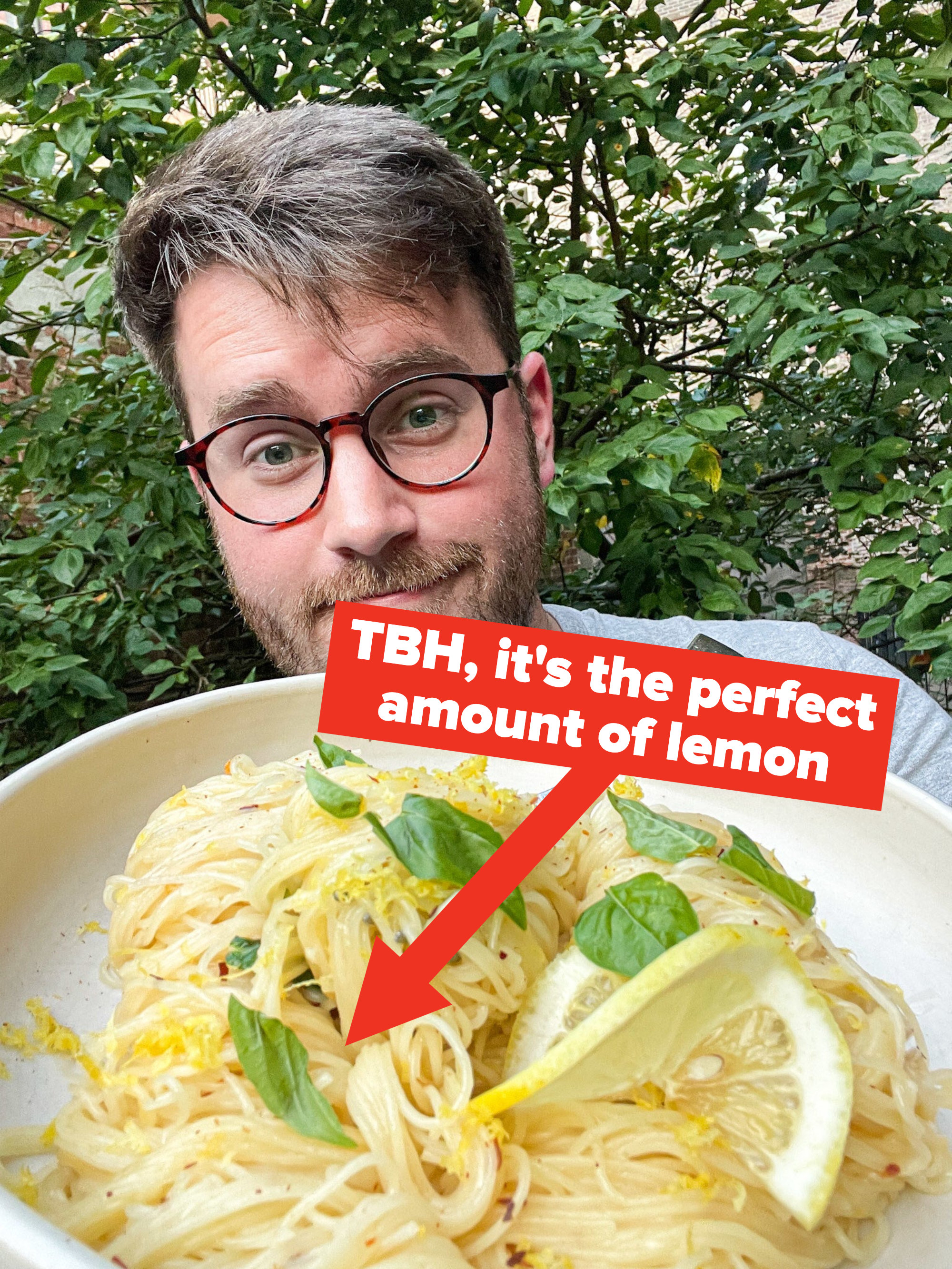 The writer with a bowl of the angel hair pasta, with caption &quot;TBH, it&#x27;s the perfect amount of lemon&quot; and arrow pointing to the pasta