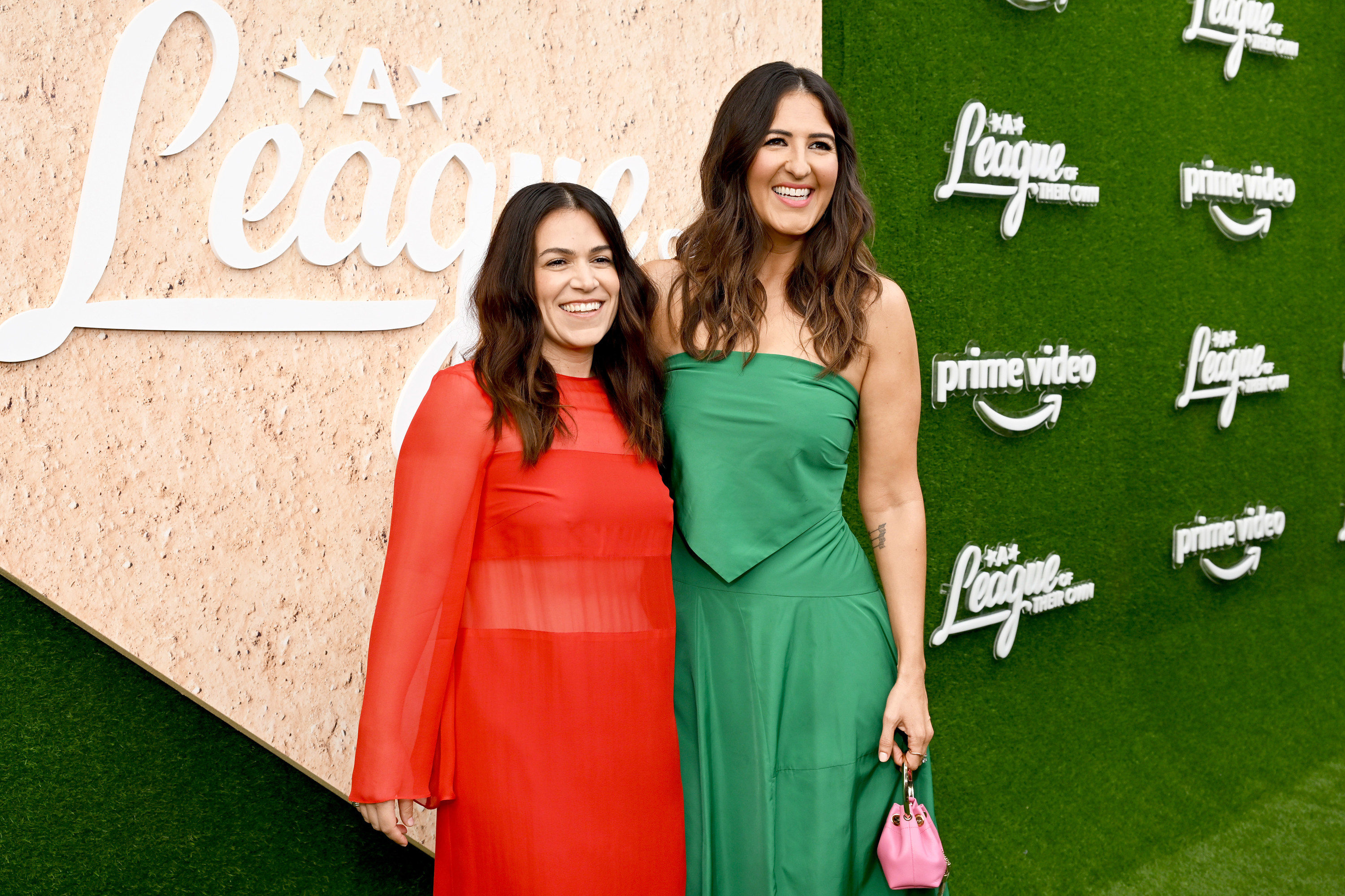 Abbi Jacobson and D&#x27;Arcy Carden pose on the red carpet