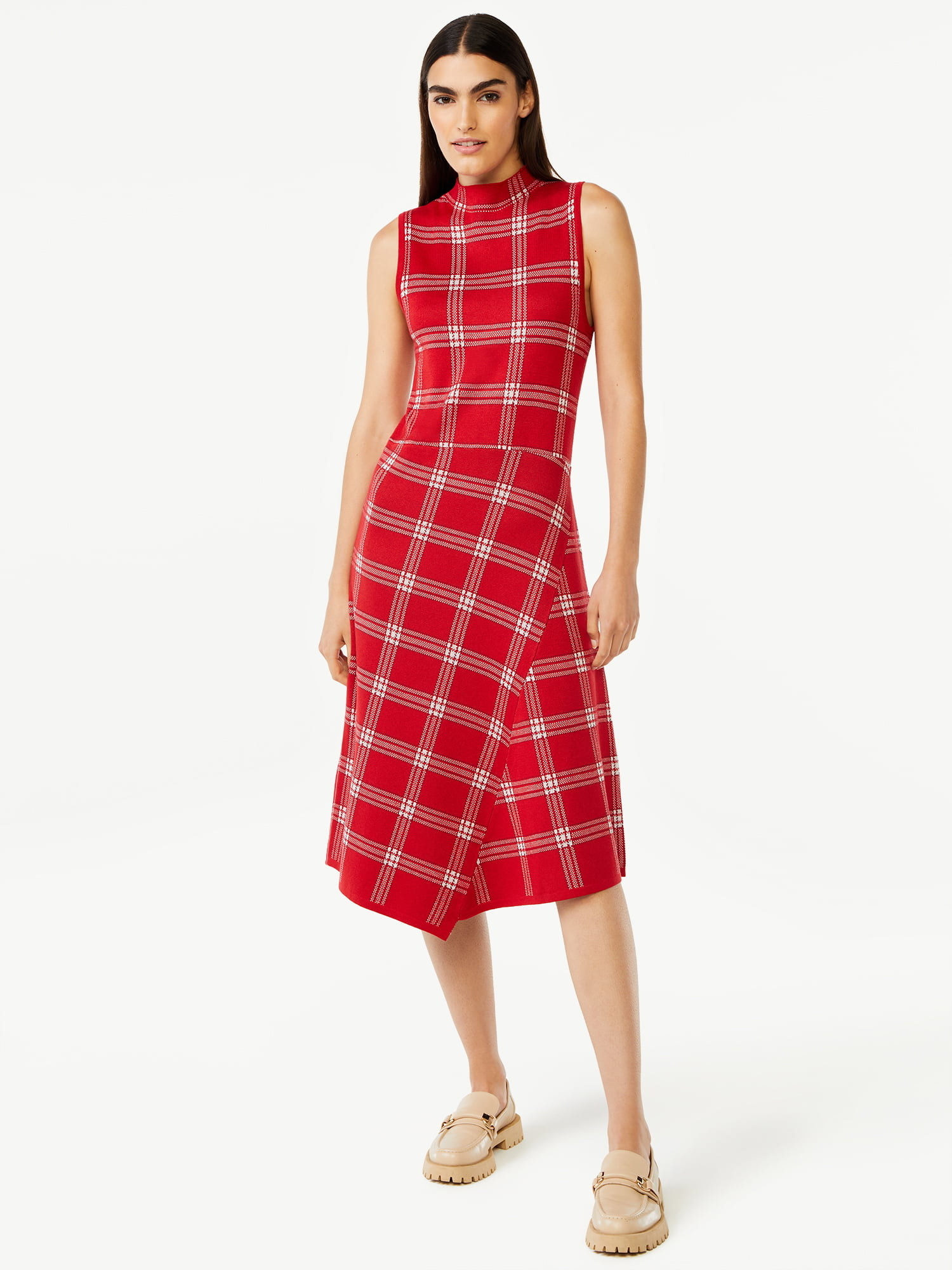 a model wearing the red plaid dress