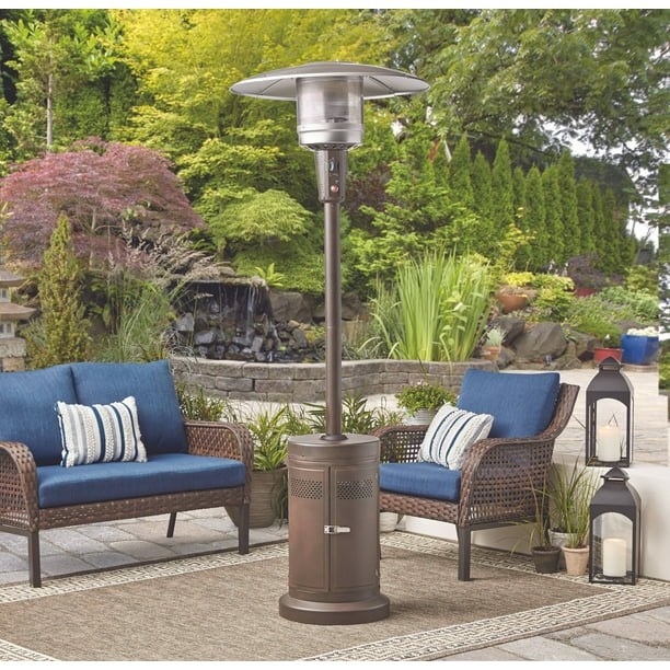 Patio heater on rug with outdoor furniture