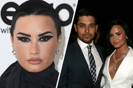 Demi Lovato poses in a black wrap top with cat-eye makeup and her head shaved. She also appears in a white blazer with a diamond necklace while standing with Wilmer Valderrama, who has on a suit and a plaid tie.