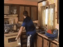 Man destroying kitchen
