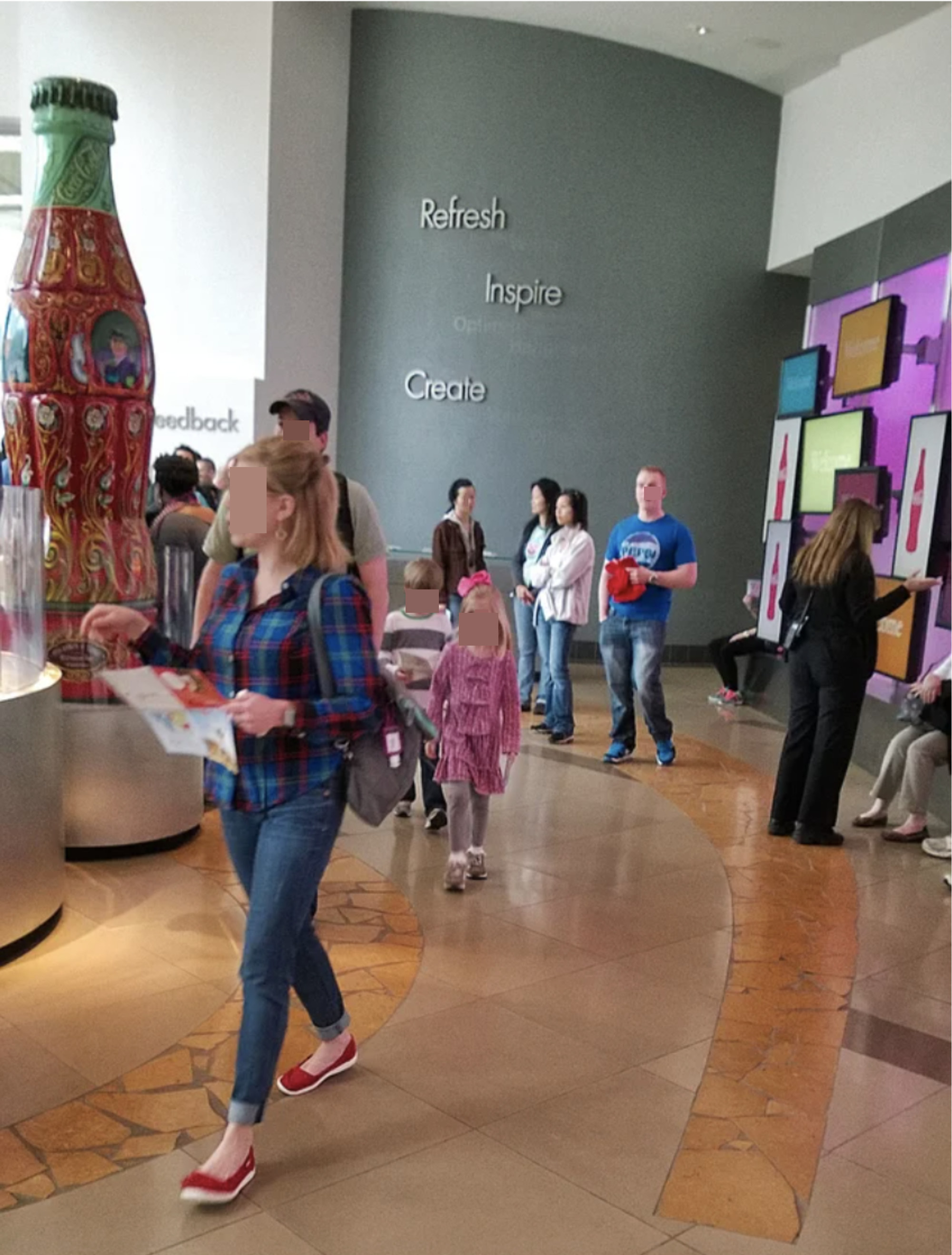 People at the Coca Cola museum