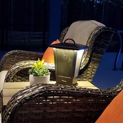 reviewer phot of the Bluetooth speaker light on a side table