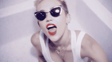 Miley Cyrus sticking out tongue