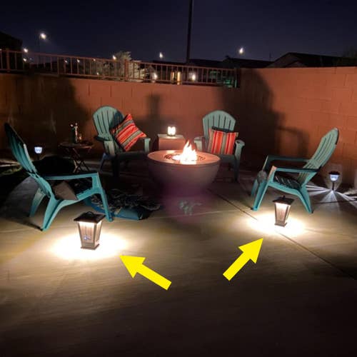 the led speakers on the ground in a reviewer's backyard