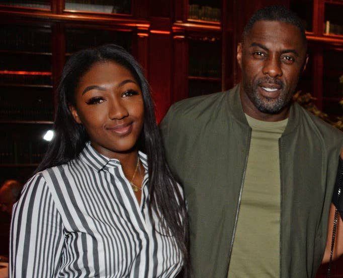 Idris and his daughter side by side