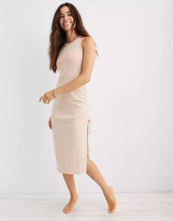 model wearing the cream colored tank dress