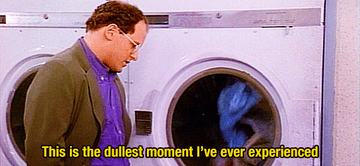 Gif of George from Seinfeld looking at dryer saying &quot;this is the dullest moment i&#x27;ve ever experienced&quot;