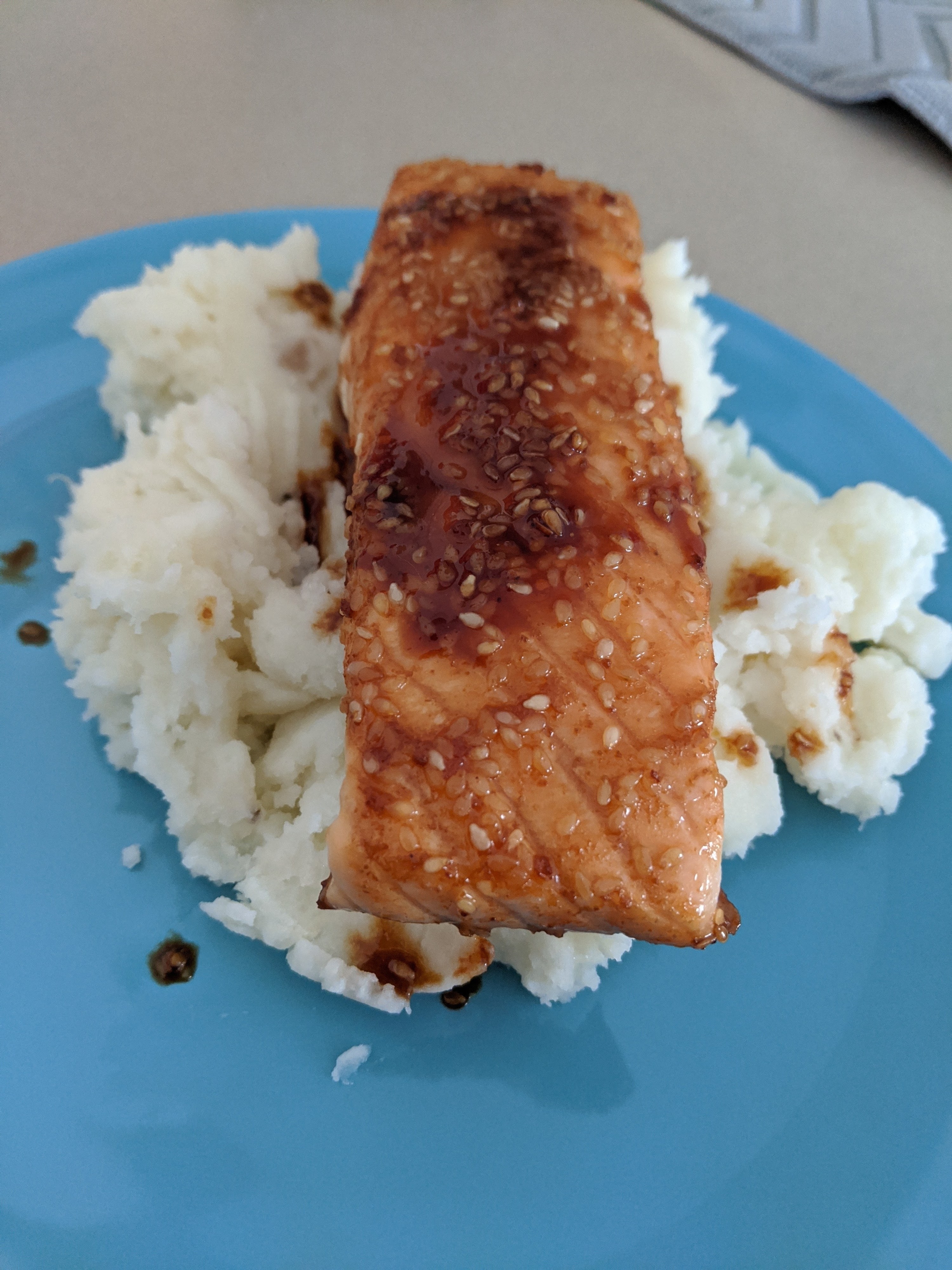 salmon on top of mashed potatoes