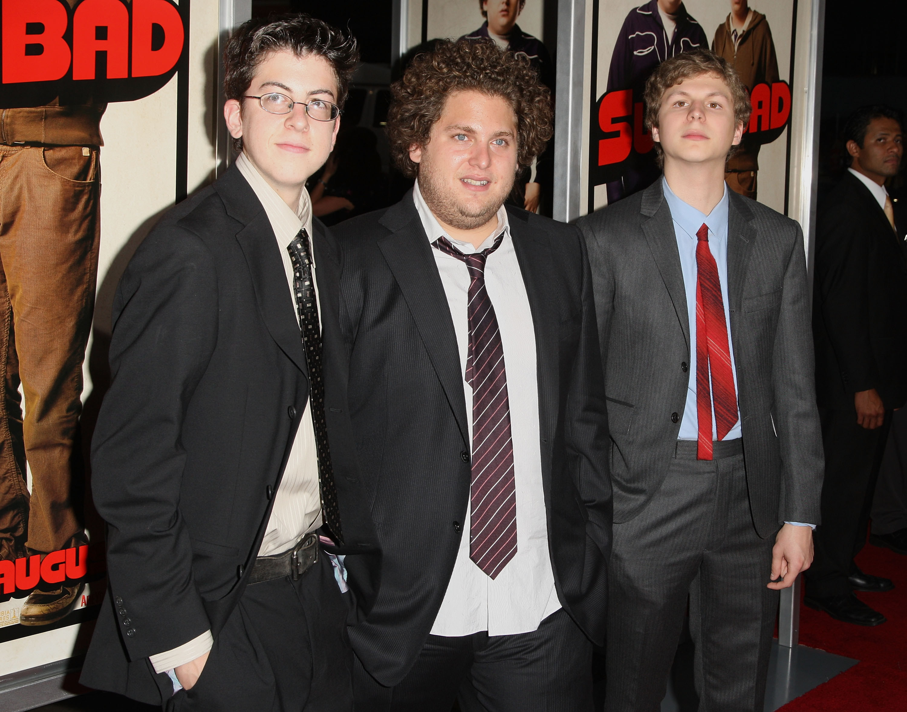 Jonah, Christopher and Michael pose at a premiere