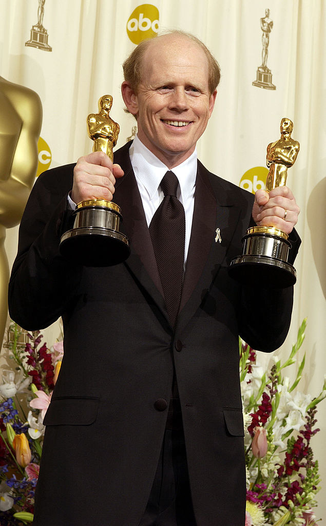 Ron Howard holding his Oscars