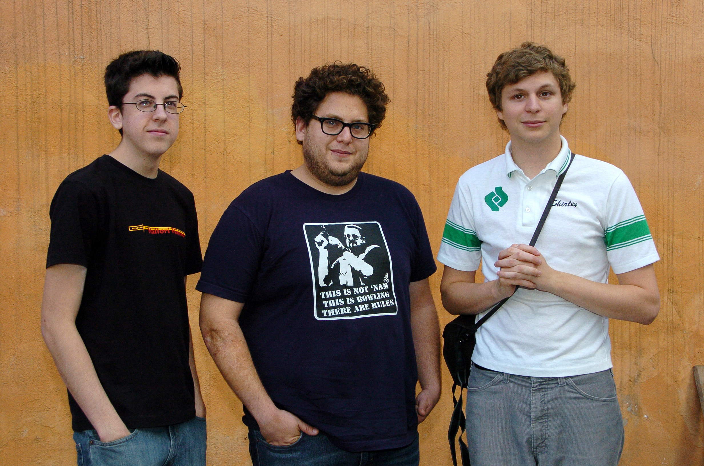 Jonah, Christopher and Michael pose at an event