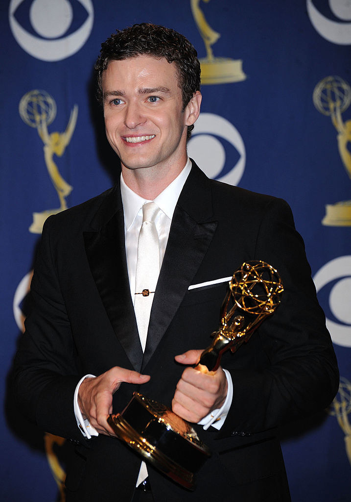 Justin Timberlake holding an Emmy