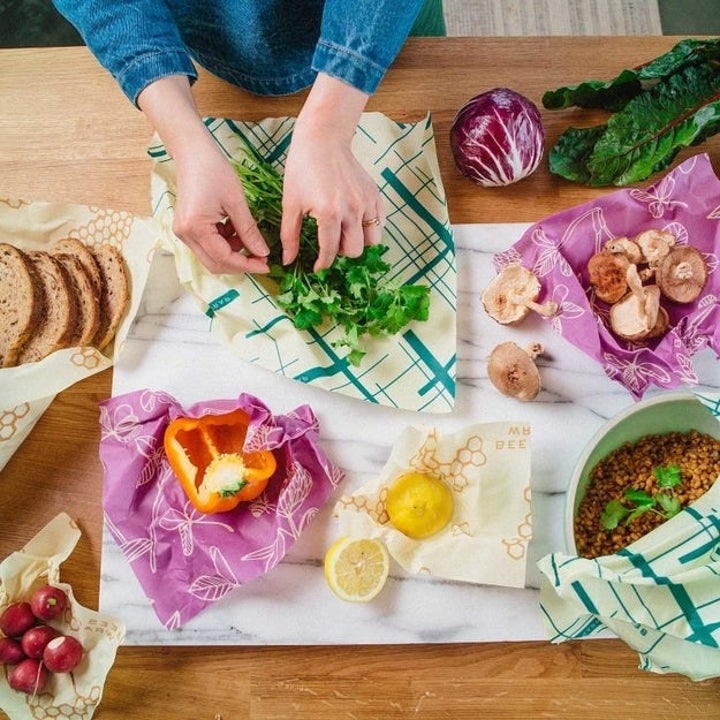various produce being stored in beeswax food wraps