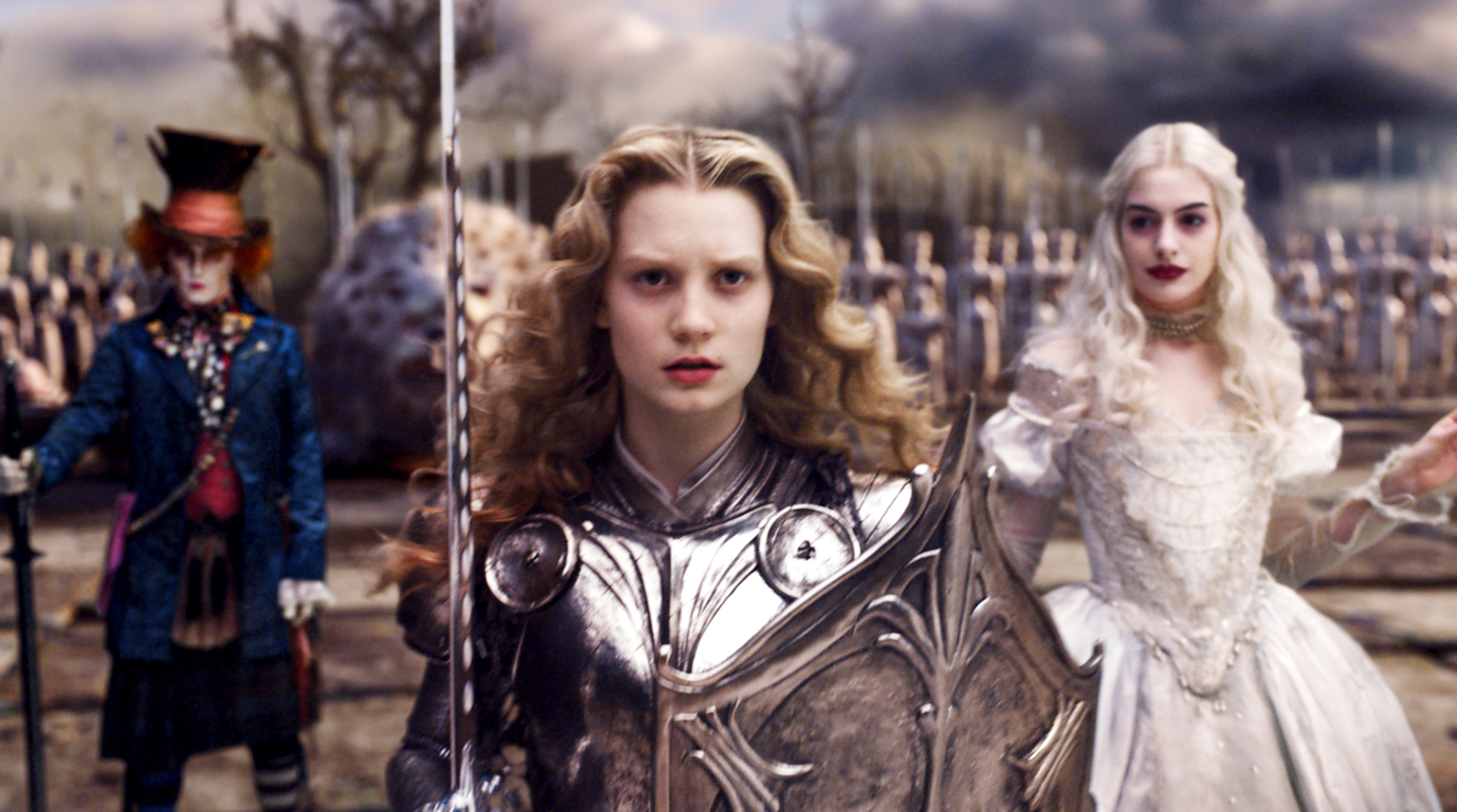Johnny Depp, Mia Wasikowska, and Anne Hathaway prepare for battle