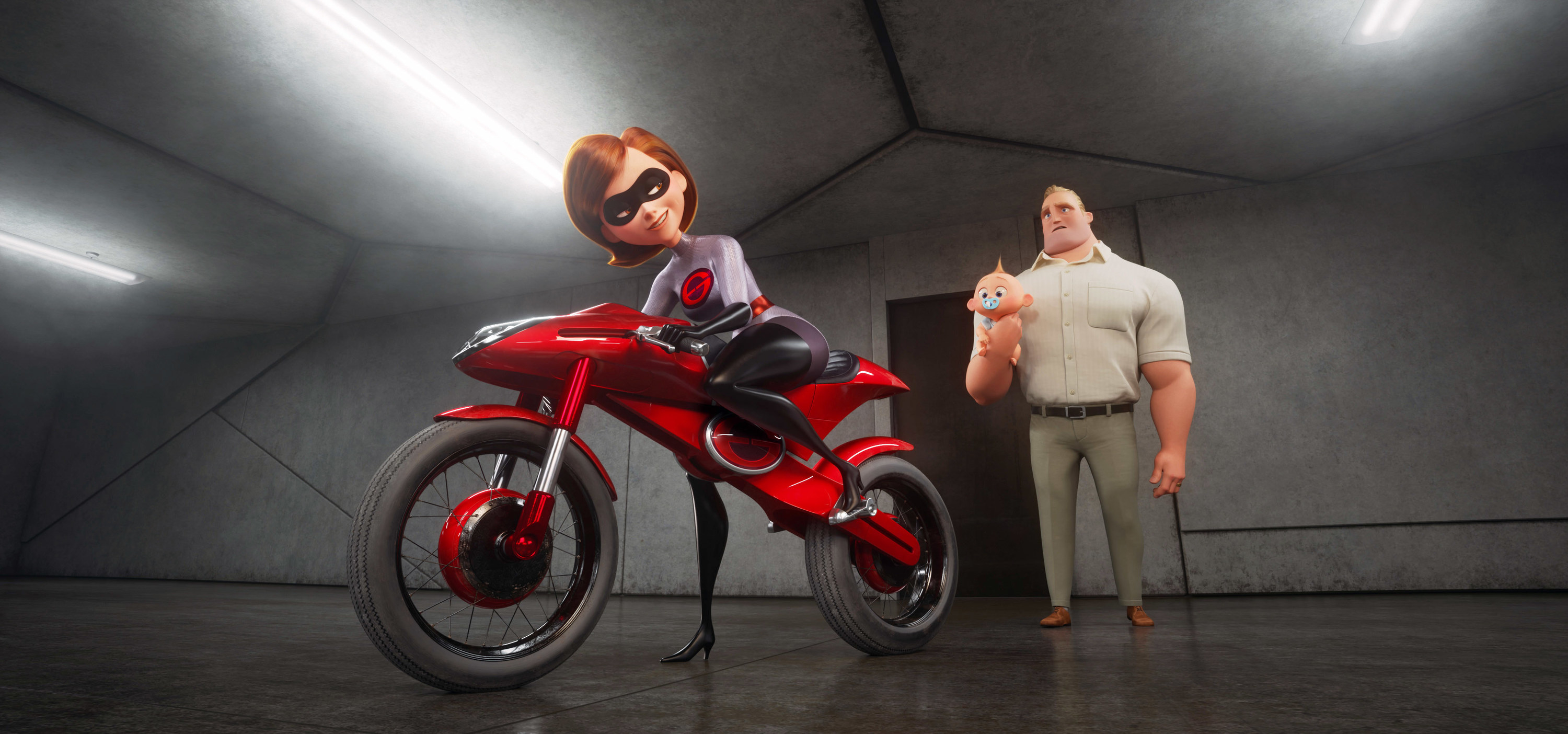 Elastigirl gets on a motorcycle while Bob Parr and Jack-Jack look on