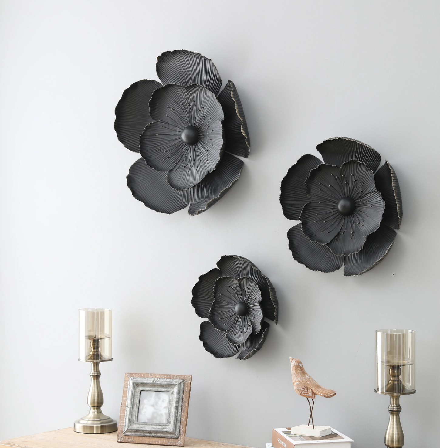 The three flowers above a console table