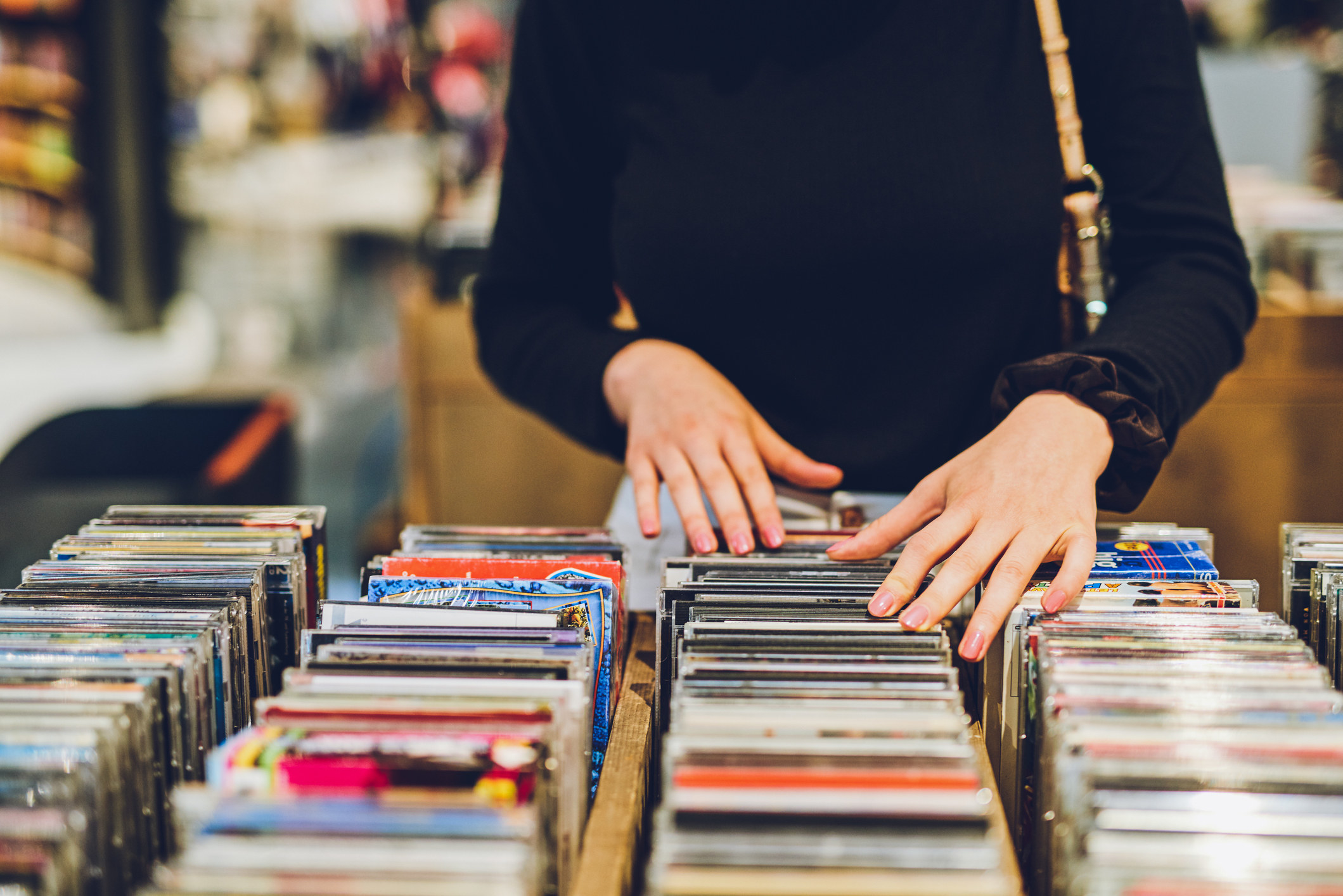 Person in a store looking through items