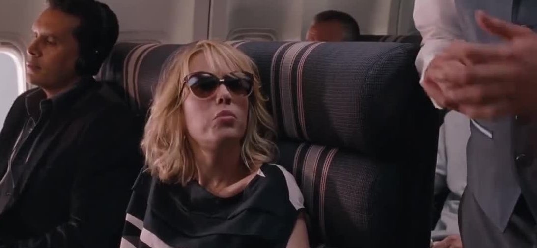 scene from &quot;bridesmaids&quot; where the woman says, &quot;help me, I&#x27;m poor&quot;