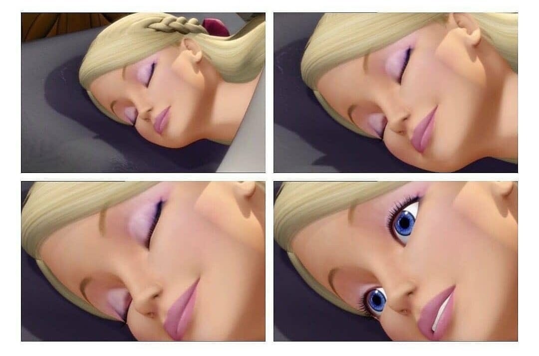 Barbie laying in bed with her eyes wide open, in panic