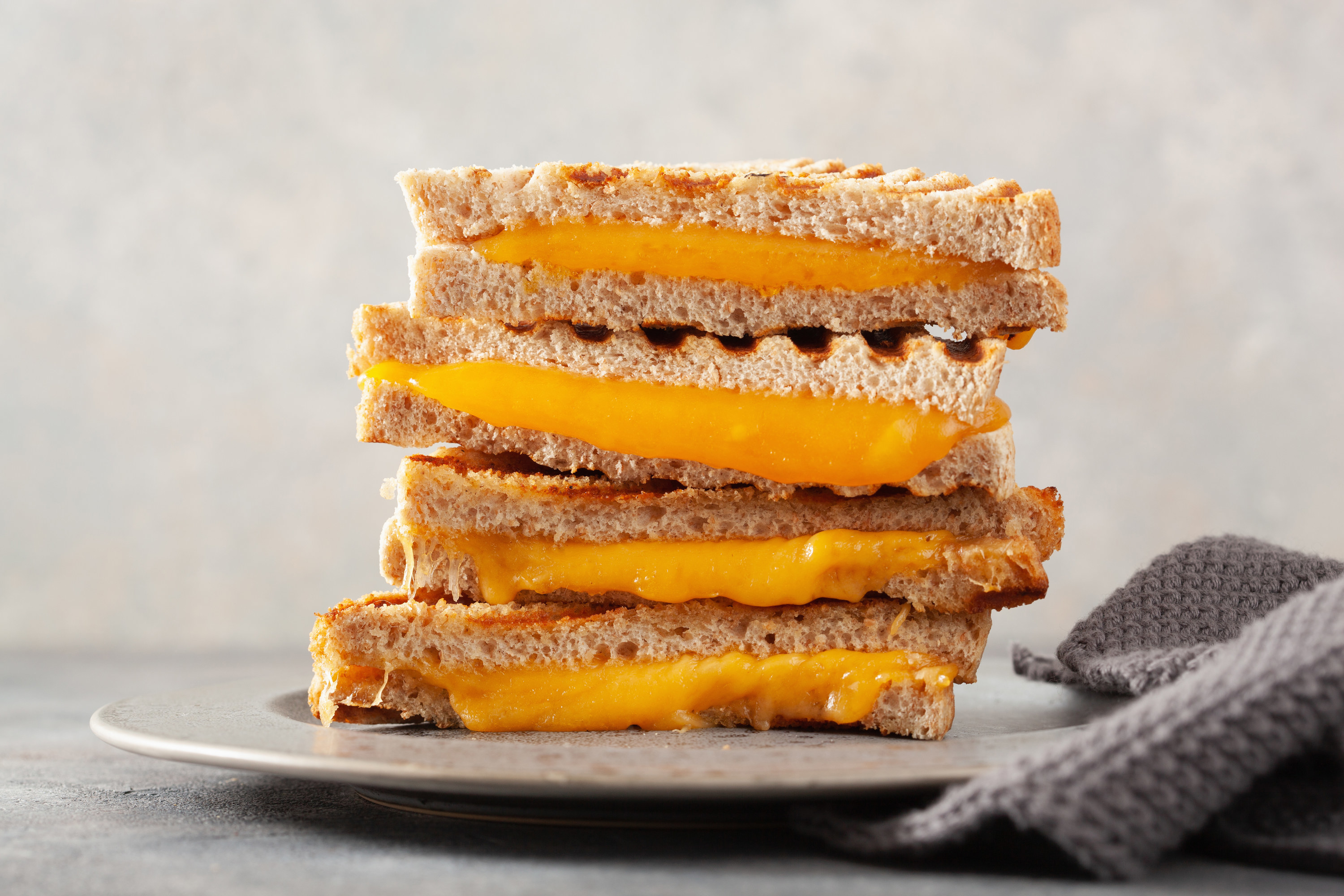 A multilayered grilled cheese