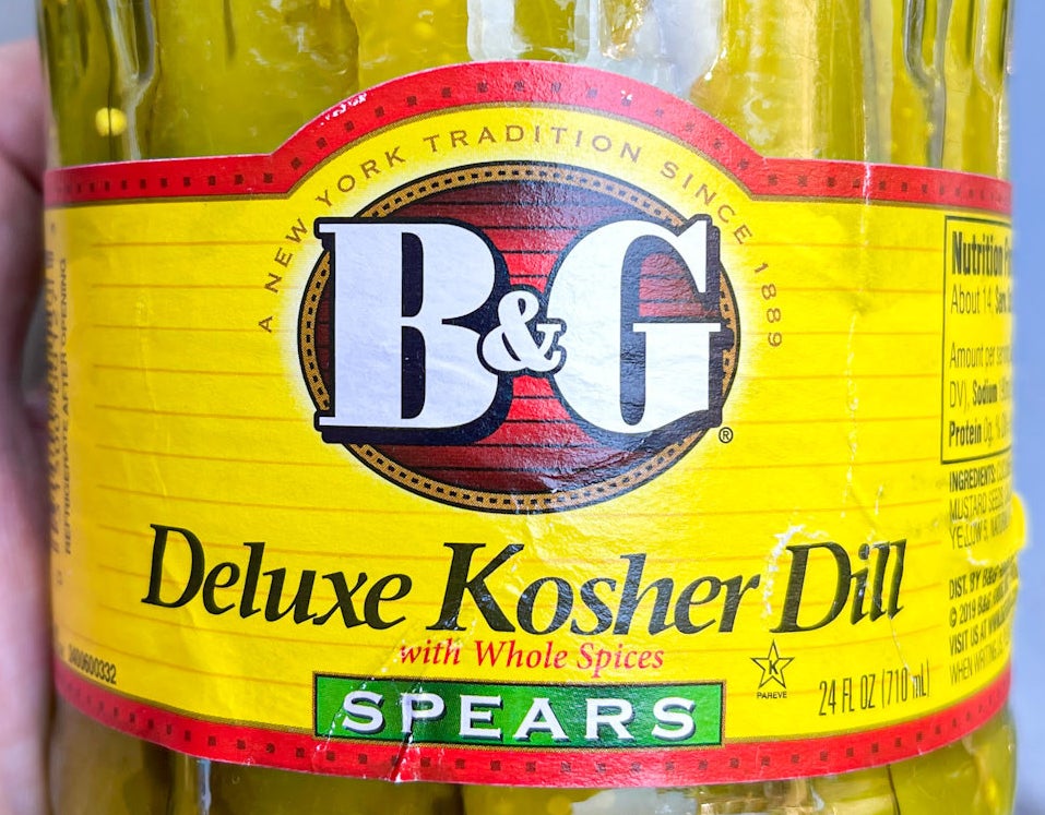 Close-up of a B&amp;amp;G Deluxe Kosher Dill pickles jar label with a description of &quot;Whole Spices&quot;