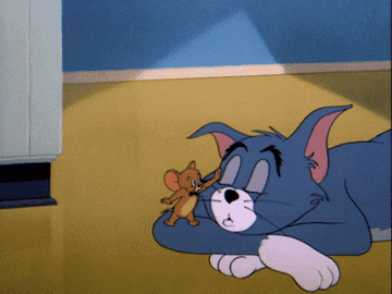 Jerry spying on sleeping Tom in &quot;Tom and Jerry&quot;