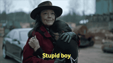 a woman shaking her head and saying, &quot;Stupid boy&quot;