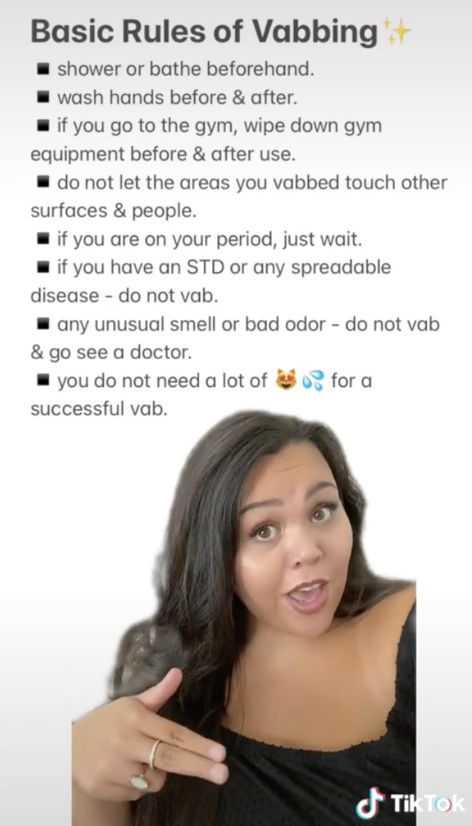 Julia gesturing with a list of &quot;Best Vabbing Practices,&quot; including &quot;shower or bathe beforehand&quot; and &quot;wash hands before and after&quot;