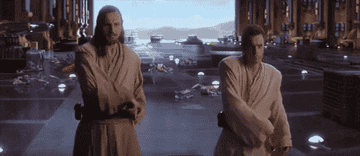 Qui-Gon and Obi-Wan whipping out their lightsabers