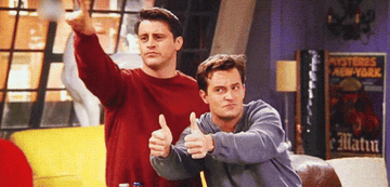 Joey putting an L to his forehead and Chandler with two thumbs up in &quot;Friends&quot;