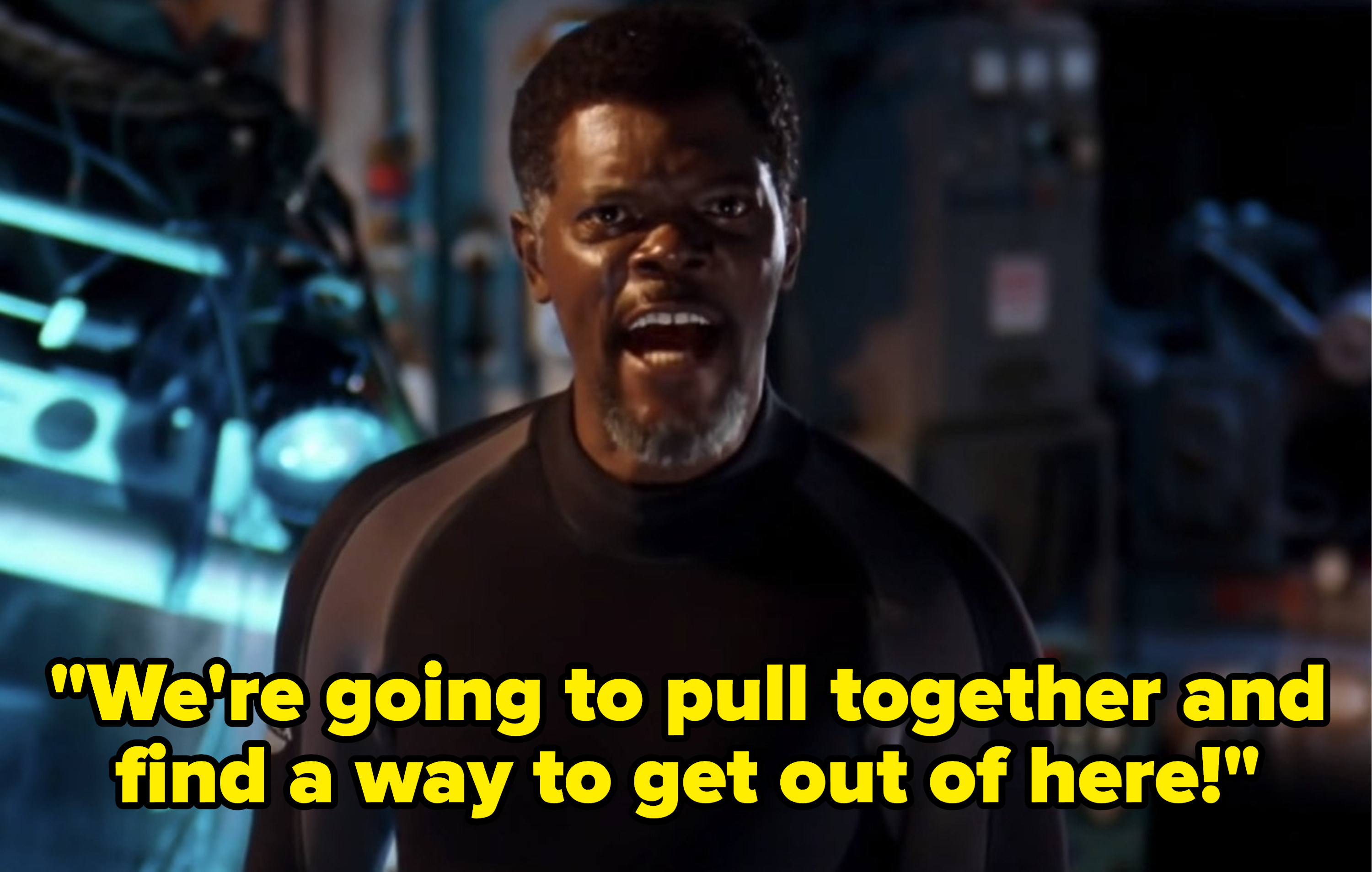 Samuel L. Jackson talking to the rest of the crew and telling them that they are going to pull together and find a way to get out of here