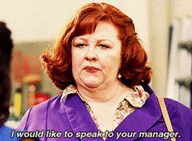 A woman saying, &quot;I would like to speak to your manager.&quot;