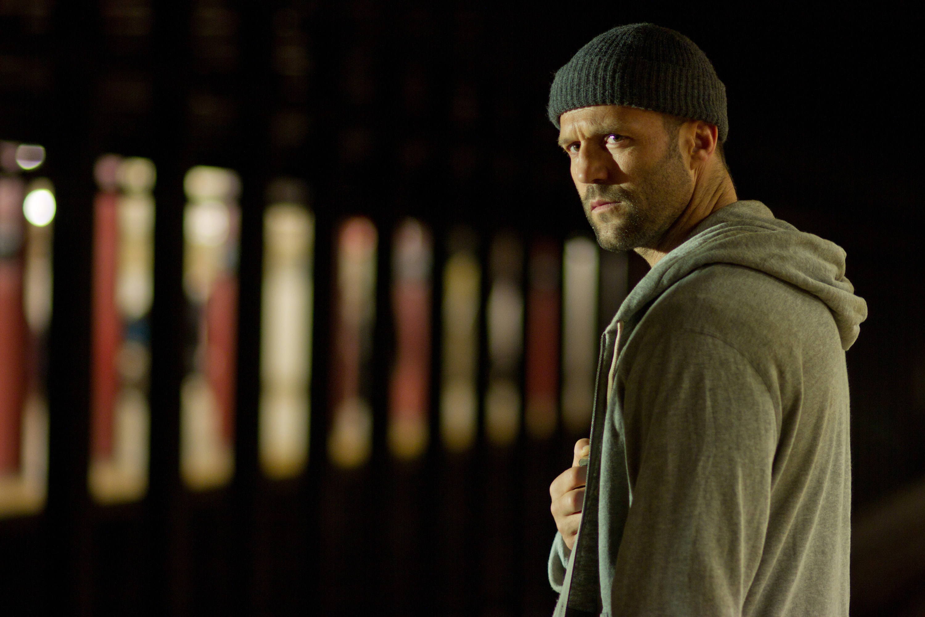 Jason Statham peers towards potential danger in &quot;Safe&quot;
