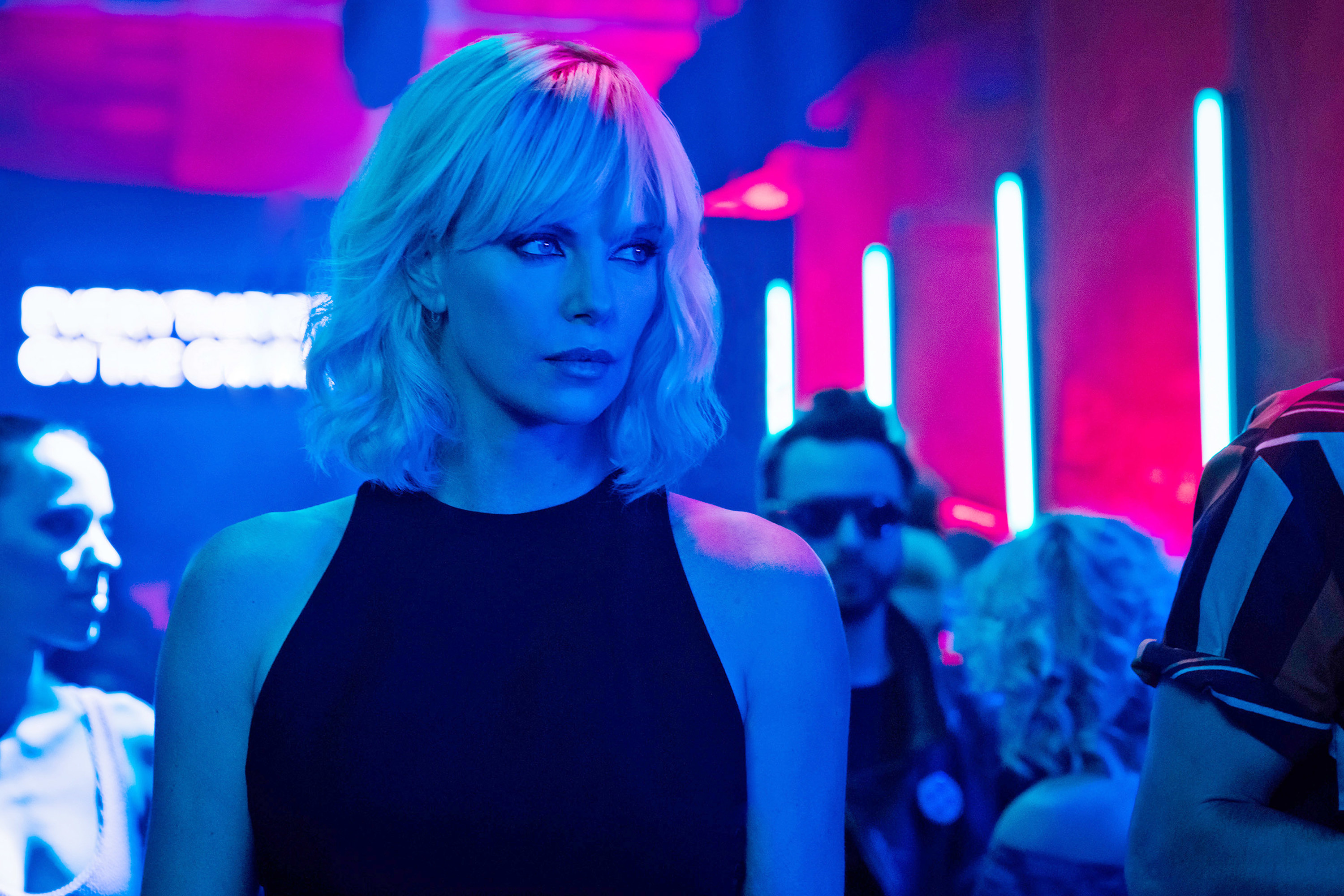 Charlize Theron keeps a vigilant watch over a nightclub in &quot;Atomic Blonde&quot;