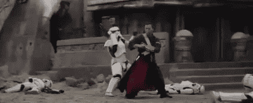Chirrut Îmwe fighting Stormtroopers with his staff