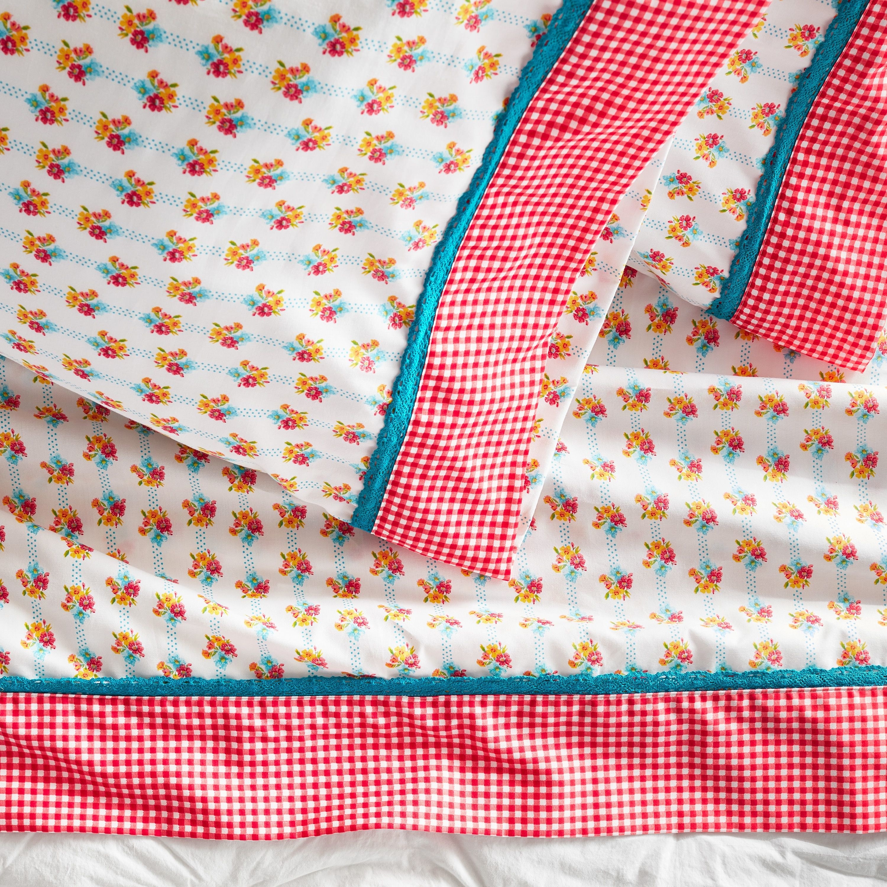 the multicolored floral and gingham sheets