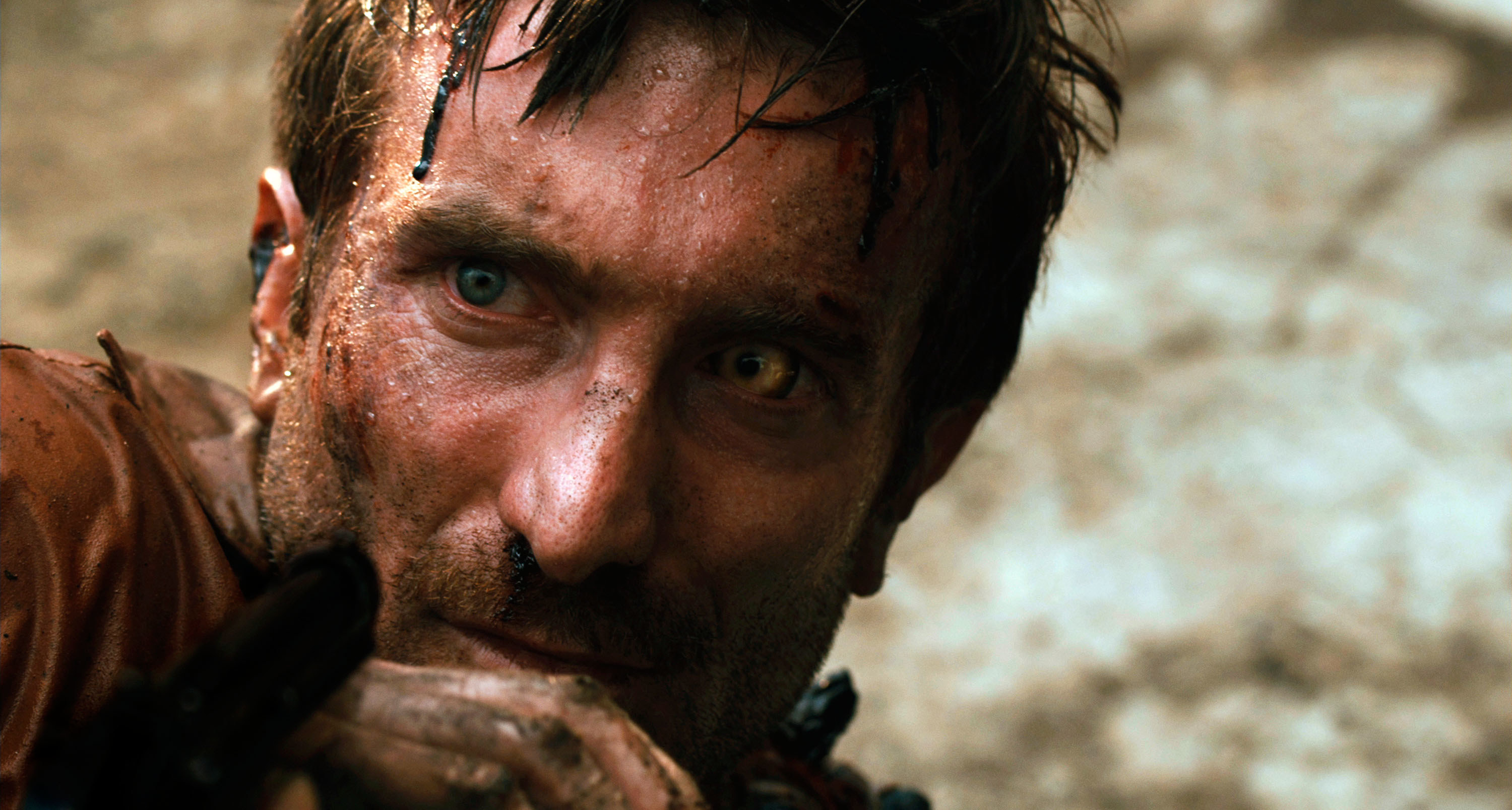 Sharlto Copley undergoes a shocking transformation in &quot;District 9&quot;
