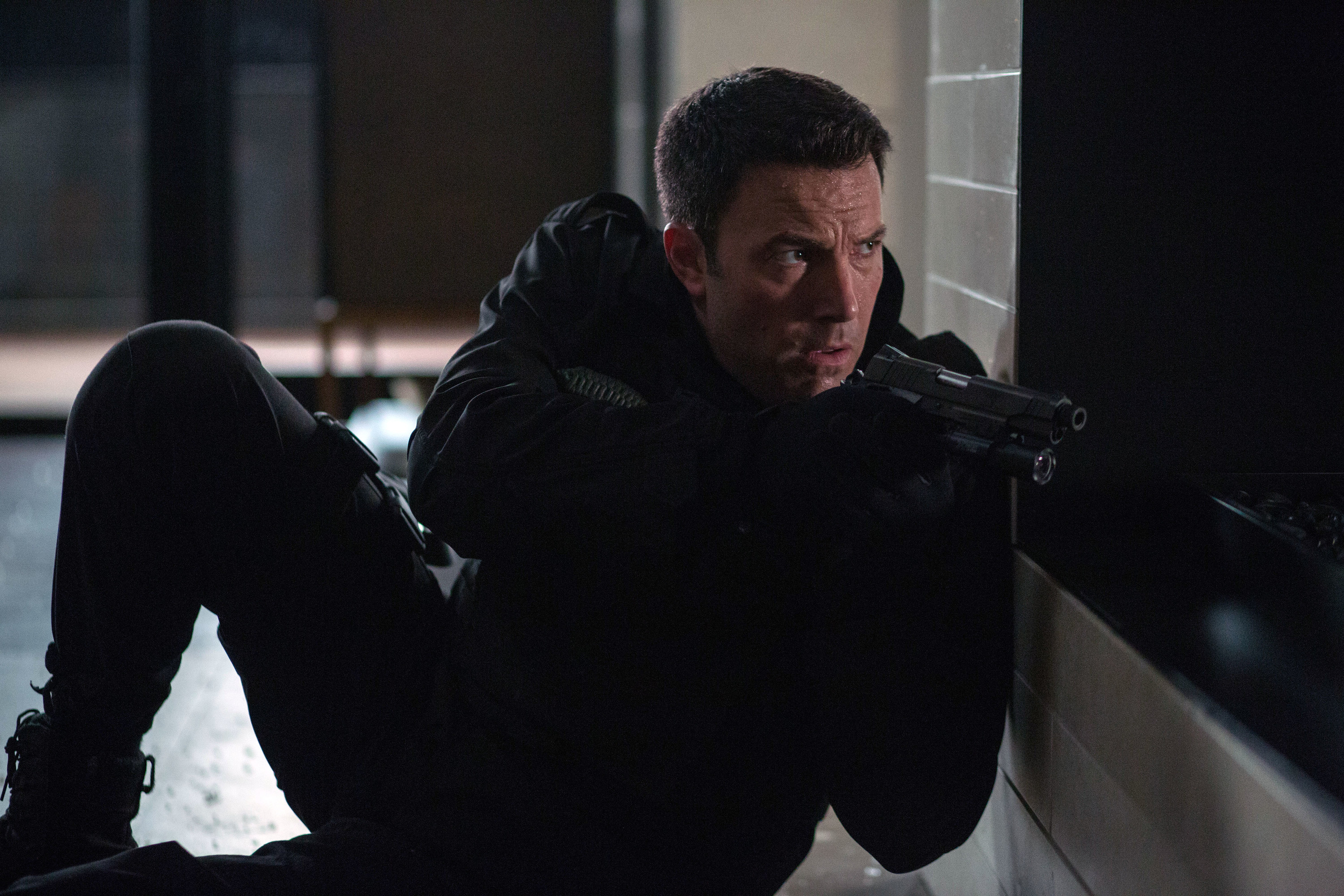 Ben Affleck scopes out his target in &quot;The Accountant&quot;