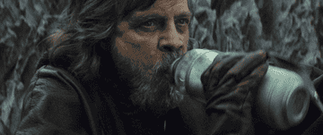 Luke drinks milk and grimaces